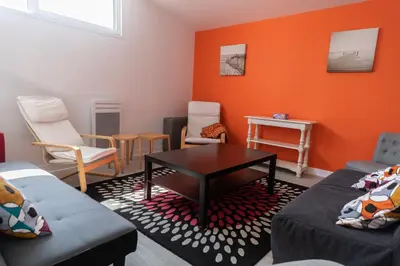 Coin salon dans l'établissement Gite de la Baie - Morgat
