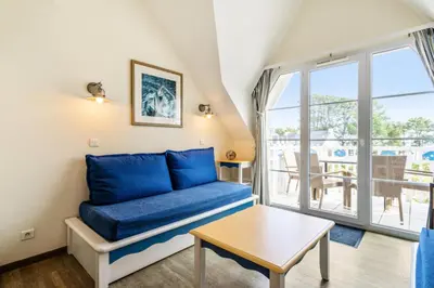 Coin salon dans l'établissement Résidence Cap Azur - maeva Home - Appartement duplex 2 Pièces 5 Personnes Sélection - Vue mer MAE-1182