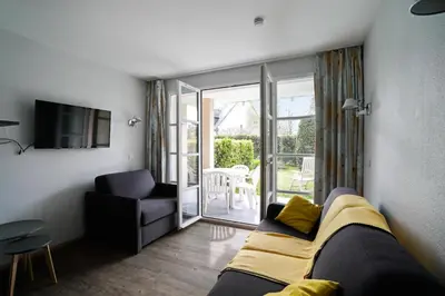 Télévision ou salle de divertissement dans l'établissement Le Cap Glénan - maeva Home - Appartement 2 Pièces 5 Personnes - Sélection MAE-7427