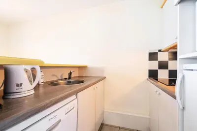 Cuisine ou kitchenette dans l'établissement Résidence Cap Azur - maeva Home - Appartement 3 Pièces 6 Personnes - Confort MAE-1051