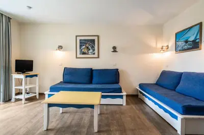 Télévision ou salle de divertissement dans l'établissement Résidence Cap Azur - maeva Home - Appartement 3 Pièces 7 Personnes - Confort MAE-4376