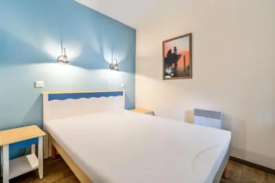 Un ou plusieurs lits dans un hébergement de l'établissement Résidence Cap Azur - maeva Home - Appartement 3 Pièces 7 Personnes - Confort MAE-4376