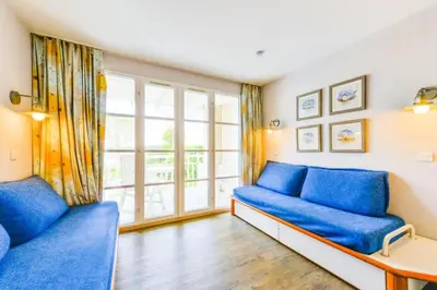 Coin salon dans l'établissement Le Cap Glénan - maeva Home - 2 Pièces 5 Personnes Confort MAE-5640