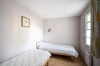 Un ou plusieurs lits dans un hébergement de l'établissement Le Cap Glénan - maeva Home - 2 Pièces 5 Personnes Confort MAE-5645