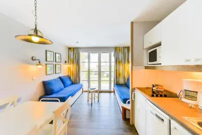 Cuisine ou kitchenette dans l'établissement Le Cap Glénan - maeva Home - 2 Pièces 5 Personnes Confort MAE-5648