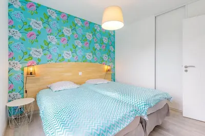 Un ou plusieurs lits dans un hébergement de l'établissement Villa Enora Bretagne Piscine Intérieure Partagée Jacuzzi privatif 100m Plage