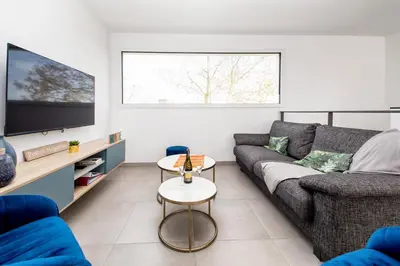 Coin salon dans l'établissement Villa Azénor Bretagne Piscine Intérieure Partagée toute l'année 100m plage