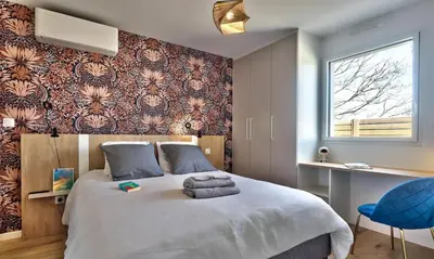 Un ou plusieurs lits dans un hébergement de l'établissement Villa Azénor Bretagne Piscine Intérieure Partagée toute l'année 100m plage