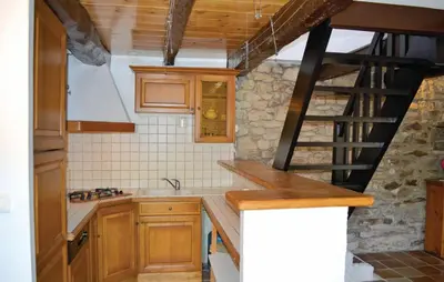 Cuisine ou kitchenette dans l'établissement Holiday Home Plozevet 59
