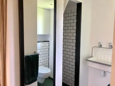 Salle de bains dans l'établissement Les bungalows de la Torche - B°3 West