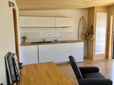 Cuisine ou kitchenette dans l'établissement Les bungalows de la Torche - B°3 West