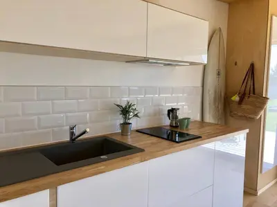 Cuisine ou kitchenette dans l'établissement Les bungalows de la Torche - B°3 West