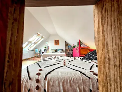 Un ou plusieurs lits dans un hébergement de l'établissement Ti vaen I Maison traditionnelle bretonne & Sauna