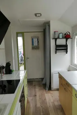 Cuisine ou kitchenette dans l'établissement Les Camélias