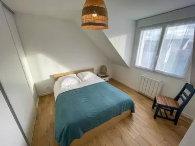 Un ou plusieurs lits dans un hébergement de l'établissement Ty Glas charmante maison 200 m de la plage