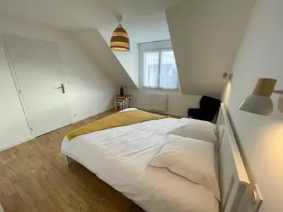 Un ou plusieurs lits dans un hébergement de l'établissement Ty Glas charmante maison 200 m de la plage