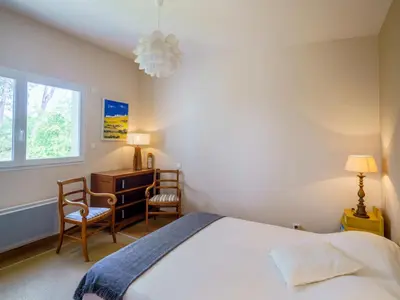 Un ou plusieurs lits dans un hébergement de l'établissement Holiday Home Maison du bois du Kador by Interhome