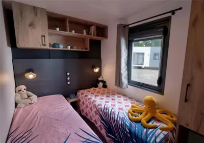 Un ou plusieurs lits dans un hébergement de l'établissement Camping de la côte des légendes