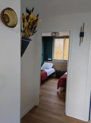 Un ou plusieurs lits dans un hébergement de l'établissement Appartement hypercentre avec vue panoramique
