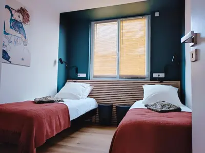 Un ou plusieurs lits dans un hébergement de l'établissement Appartement hypercentre avec vue panoramique
