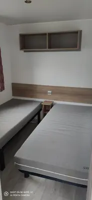 Un ou plusieurs lits dans un hébergement de l'établissement Domaine de karlann 4Etoiles Mobil-home