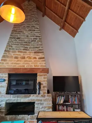 Télévision ou salle de divertissement dans l'établissement Moulin de Bonnescat