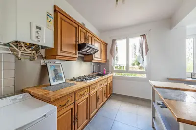 Cuisine ou kitchenette dans l'établissement Ty'brestoise proche centre - jardin- parking gratuit