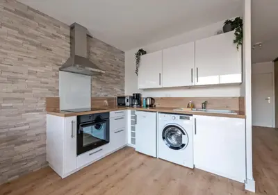 Cuisine ou kitchenette dans l'établissement Charmant appartement vue mer - PLOUGONVELIN