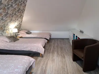 Un ou plusieurs lits dans un hébergement de l'établissement Holiday home 10 pers , panoramic sea view, Cléder