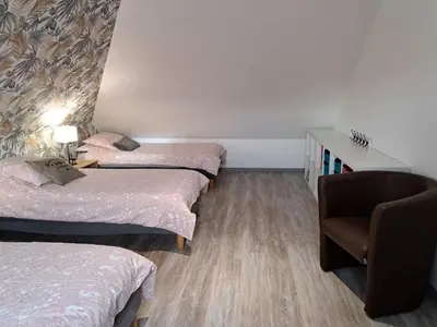 Un ou plusieurs lits dans un hébergement de l'établissement Holiday home 10 pers , panoramic sea view, Cléder