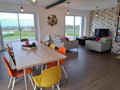 Coin salon dans l'établissement Holiday Home in Brittany with Sea Views