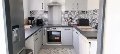 Cuisine ou kitchenette dans l'établissement Harmonia proche du centre et de Gourvily
