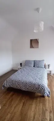 Un ou plusieurs lits dans un hébergement de l'établissement Maël-Carhaix location Maison 4 chambres