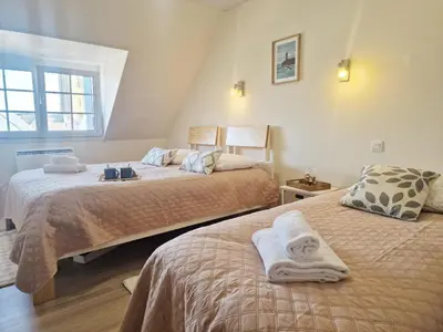 Un ou plusieurs lits dans un hébergement de l'établissement Charming Penty 2-4 people, Morlaix bay