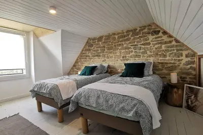 Un ou plusieurs lits dans un hébergement de l'établissement La Villa d'Anna, une décoration très tendance !