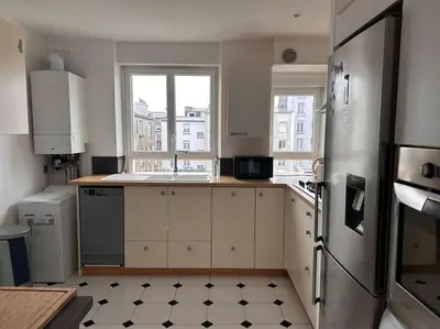 Cuisine ou kitchenette dans l'établissement Jaurès-Pilier rouge/App spacieux/3 chambres/6 pers