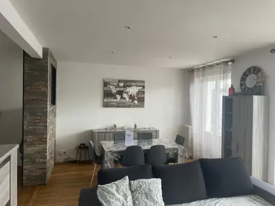 Coin salon dans l'établissement Jaurès-Pilier rouge/App spacieux/3 chambres/6 pers