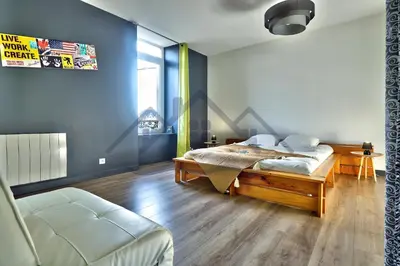 Un ou plusieurs lits dans un hébergement de l'établissement LocaLise - M2A - Ty Maen Gouloù - Maison avec extérieur entièrement clos - Proche du centre et du port - Draps inclus - Animaux bienvenus