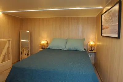 Un ou plusieurs lits dans un hébergement de l'établissement Tiny house proche de Morgat