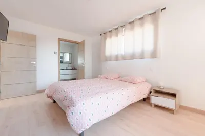 Un ou plusieurs lits dans un hébergement de l'établissement Villa Vue Mer