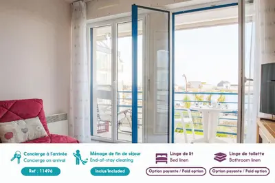 Télévision ou salle de divertissement dans l'établissement À 200m de la plage, appartement vue mer pour 2