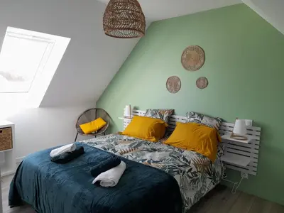 Un ou plusieurs lits dans un hébergement de l'établissement La casa Tata
