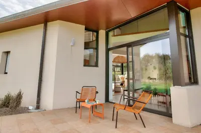 Balcon ou terrasse dans l'établissement Jardin et piscine - 1km de la plage de Mousterlin