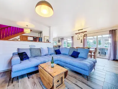Coin salon dans l'établissement Holiday Home Guiriden by Interhome