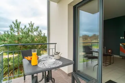 Balcon ou terrasse dans l'établissement Le Jardin des Thermes - Proche Thalasso