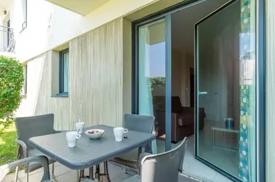 Balcon ou terrasse dans l'établissement Les Thermes 404 - Appt proche plage avec piscine partagée