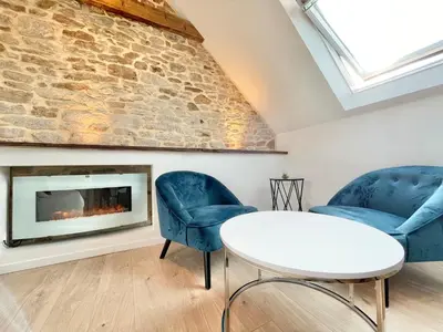 Coin salon dans l'établissement LE CALLOCH 3D - Standing - Calme - Wifi - Smart TV