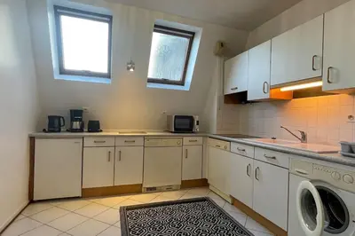 Cuisine ou kitchenette dans l'établissement Ar ranndi