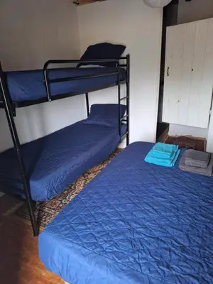 Un ou plusieurs lits dans un hébergement de l'établissement Gite Des Monts D'Arrée