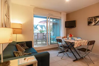 Coin salon dans l'établissement Liorzh - Appt proche plage idéal pour familles